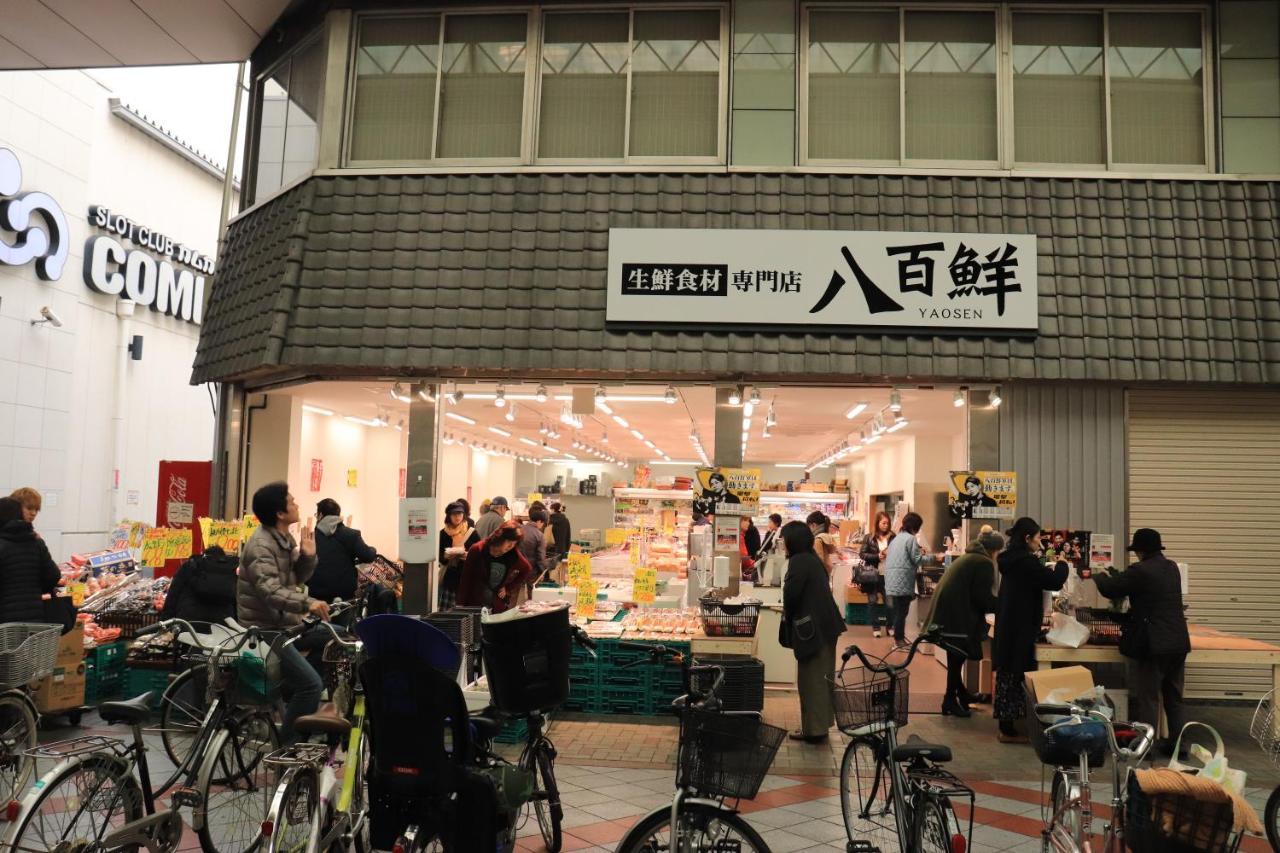大阪ドーム徒歩10分、九条駅から3分、難波直通6分、海遊館7分、usj11分 Osaka